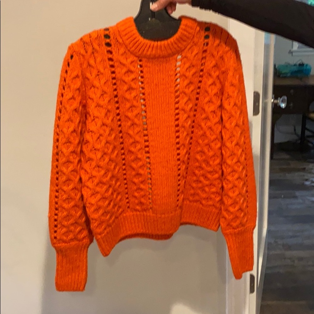 orange sweater